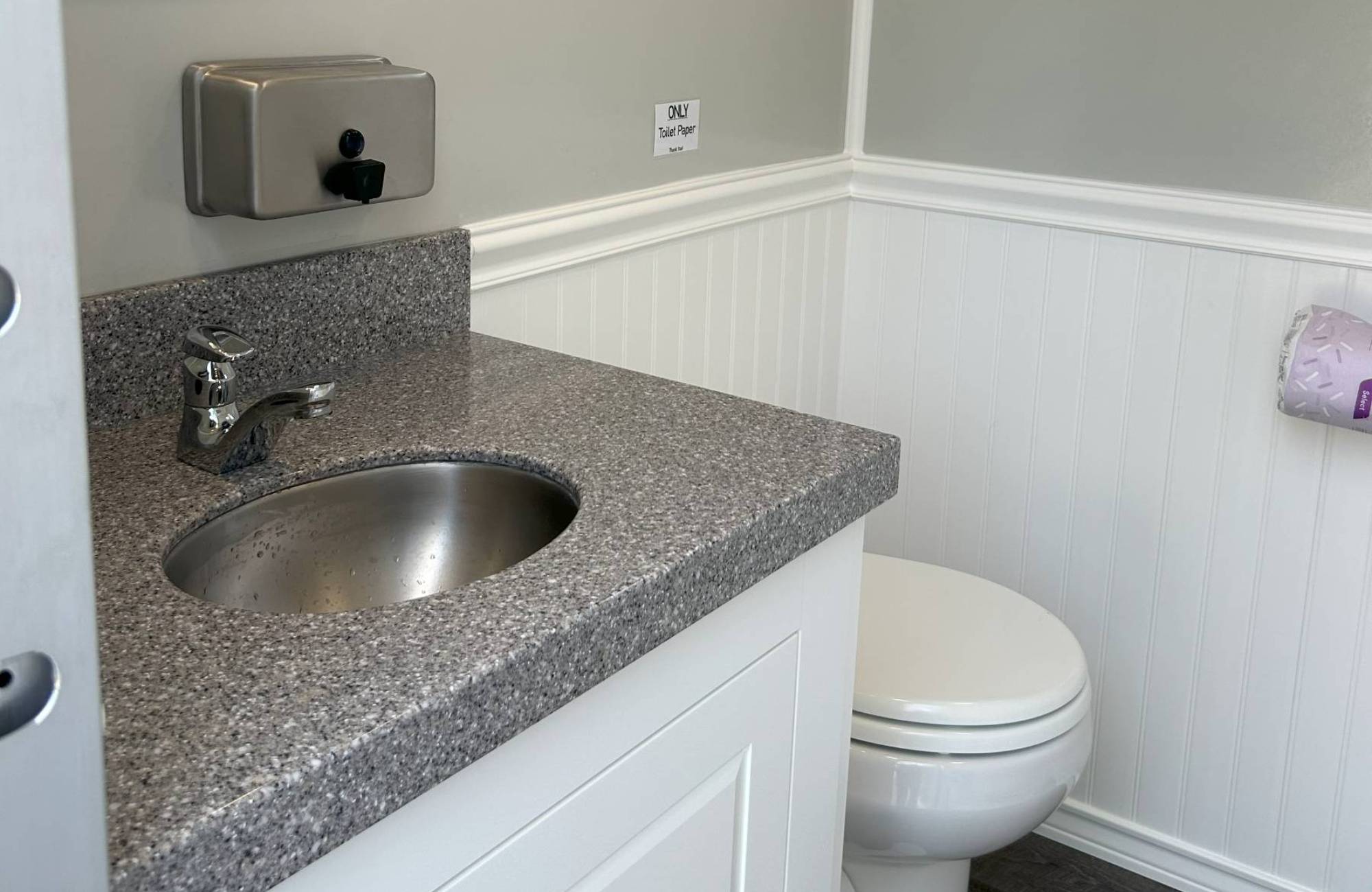 counter toilet inside washroom trailer rental