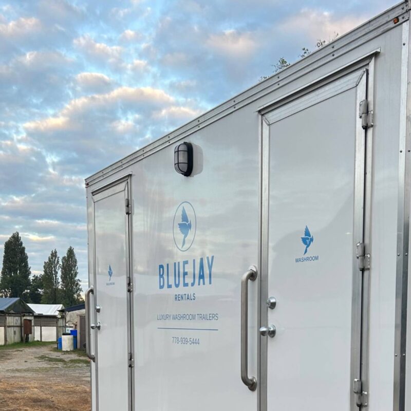 triple washroom trailer outside construction site