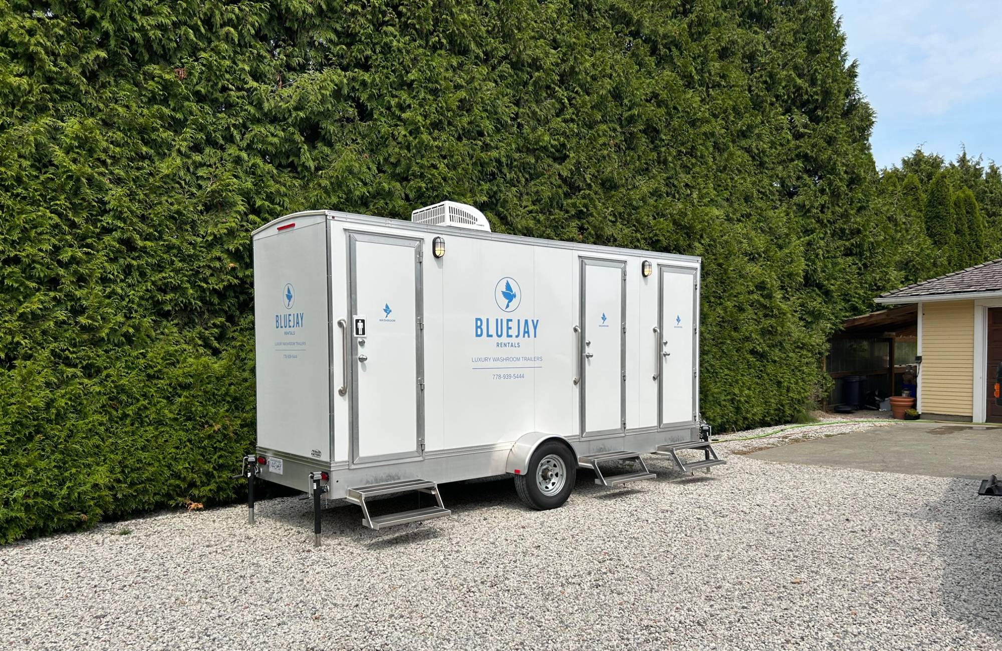 washroom rental trailer unit outside park for family event