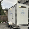 emergency washroom rental parked outside of residence