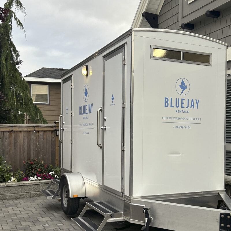 emergency washroom rental parked outside of residence